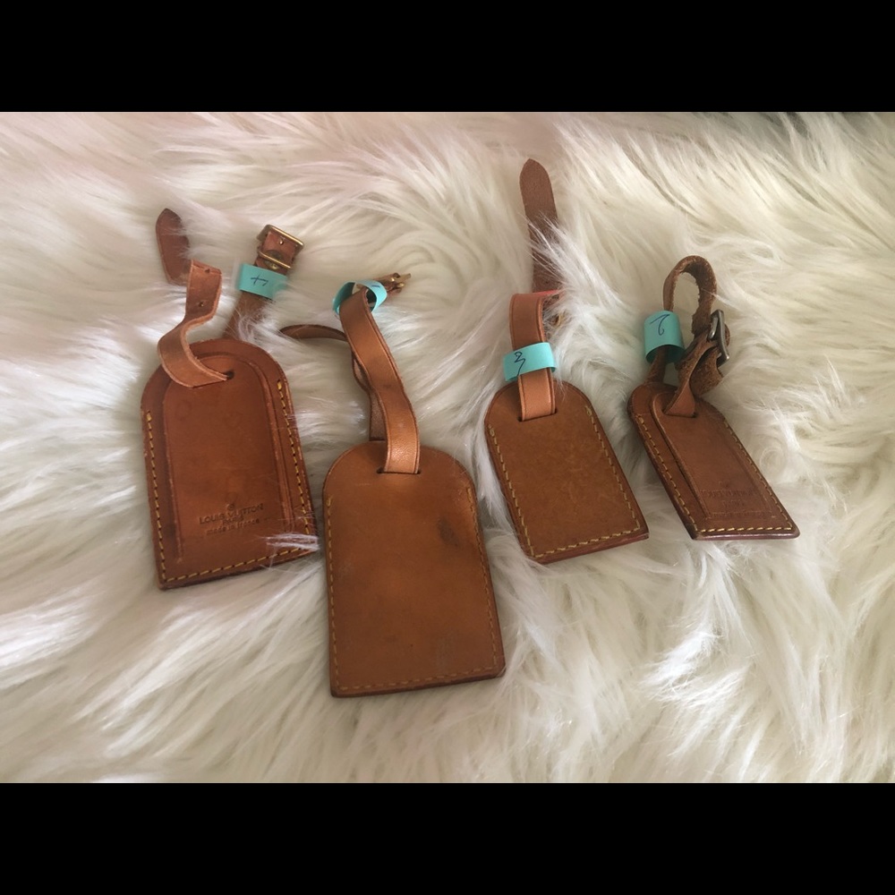 4 authentic Louis Vuitton luggage tags